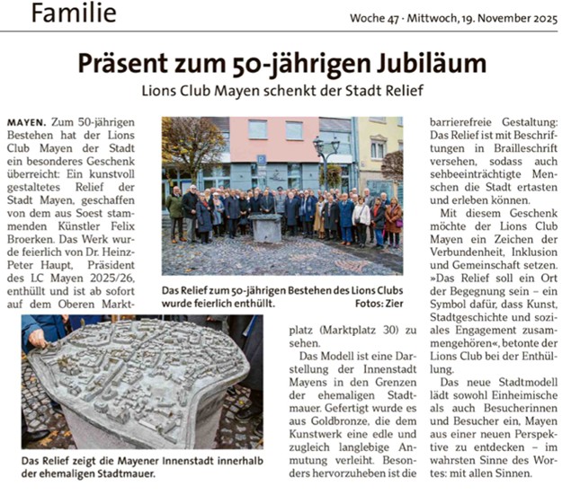 Der Zeitungsartikel beschreibt den Anlass und zeigt die Bilder vom Modell und von der Gruppe, die zur Einweihung erschienen ist